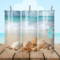 All sides of tumbler showing seashells on beach with ocean waves